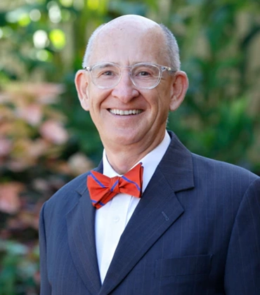 Portrait of Neil Anderson outdoors.