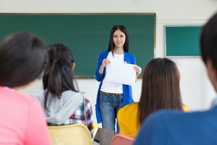 College teacher and students in the classroom